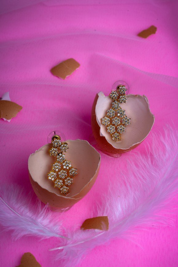 les boucles d oreilles womans-beauty-is-always-enhanced-with a pair of earing muhammed mushin kannur creativehut