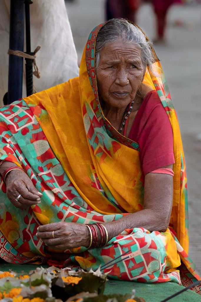 old lady selling flowers
