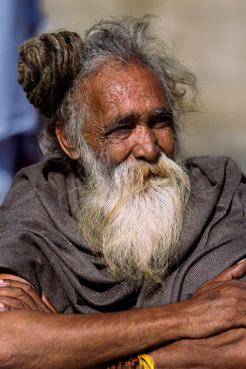 sadhu sitting with black cloth