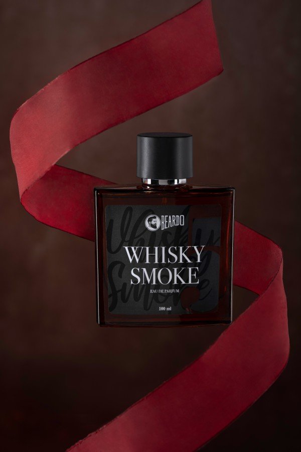 perfume inside in a zig zag shaped ribbon