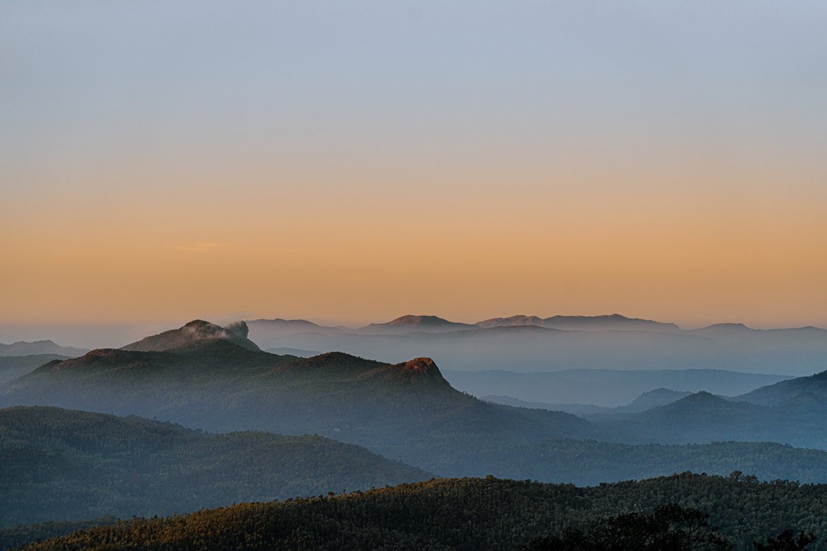 mountains with orange sky
