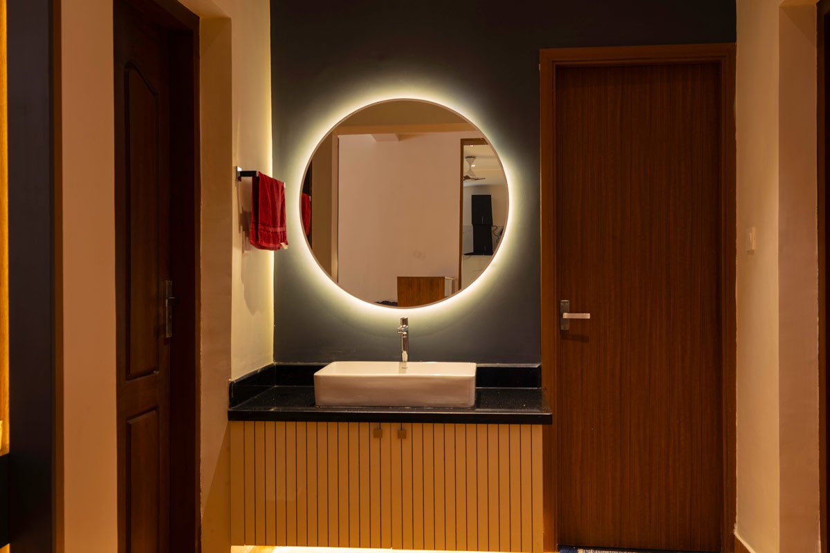 round mirror with yellow LED light