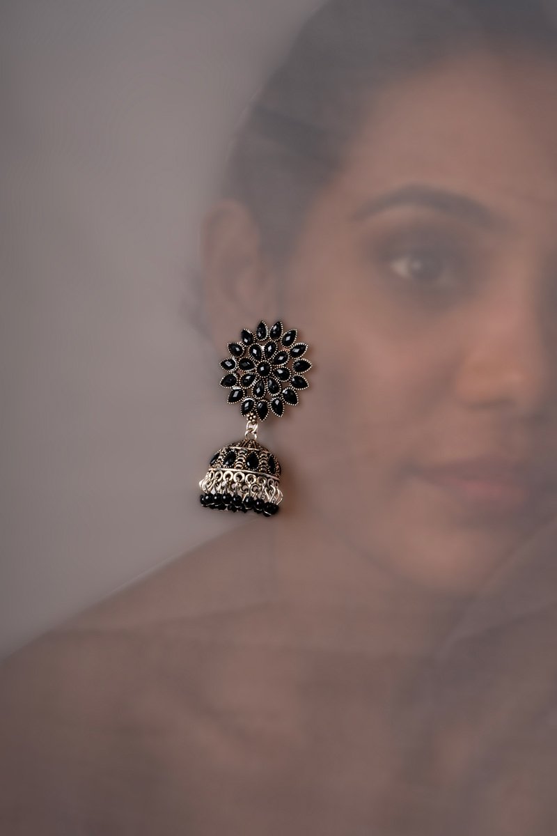 a girl with jhumka