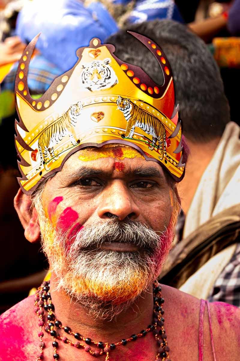 Old men with red colour on body