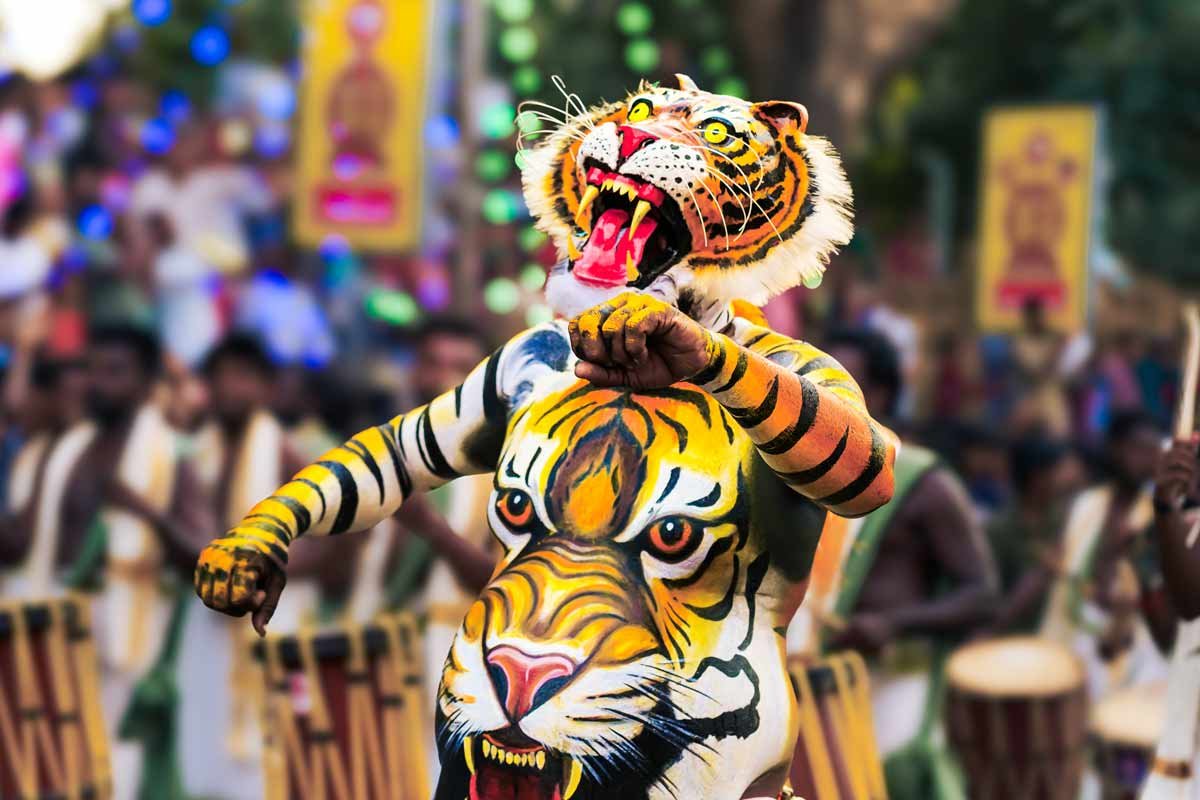 a performer dancing amidst festival