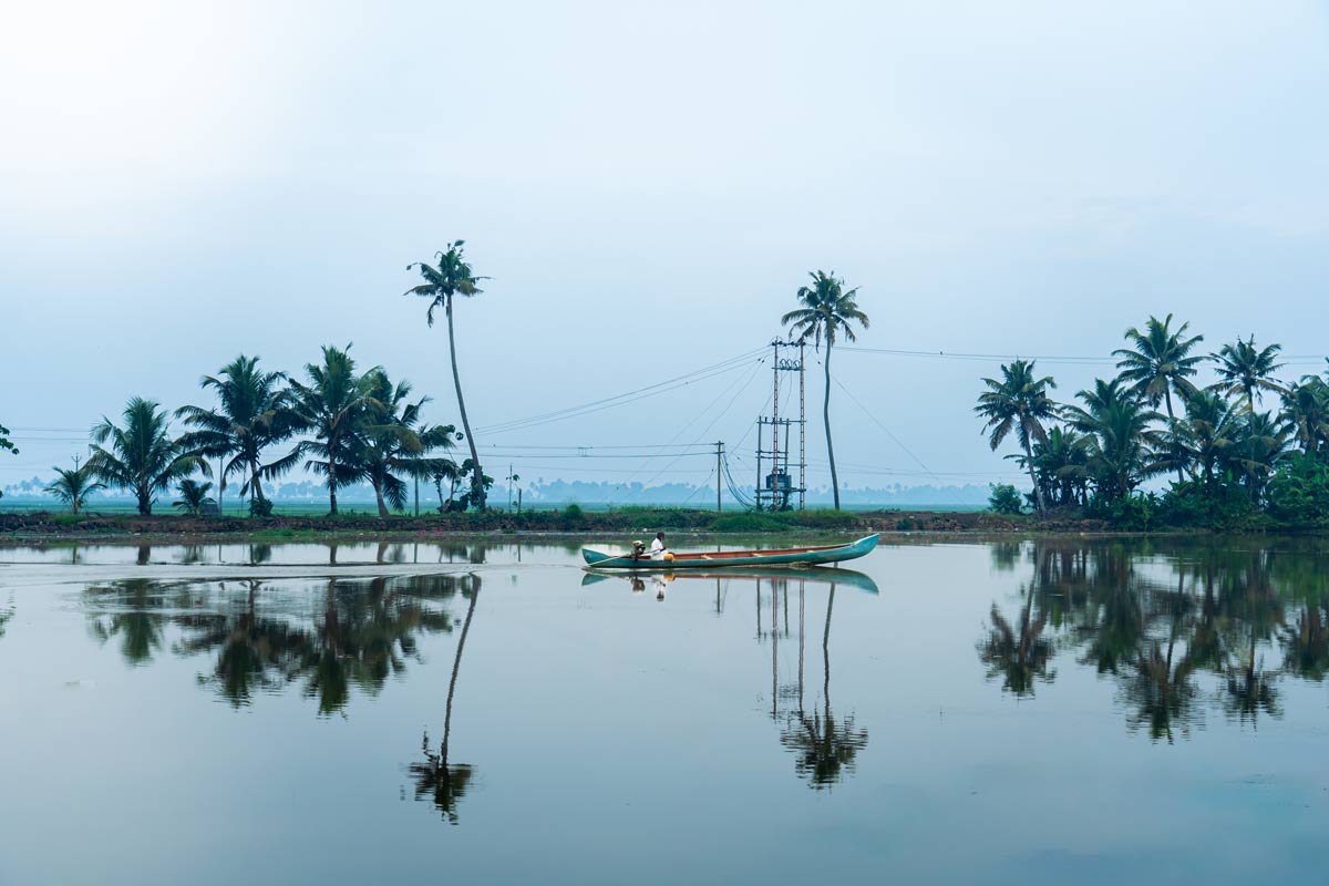 a lone rower going to work in the morning