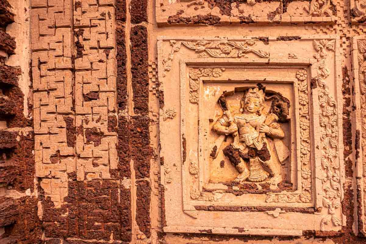 lord hanuman sculpted on temple wall