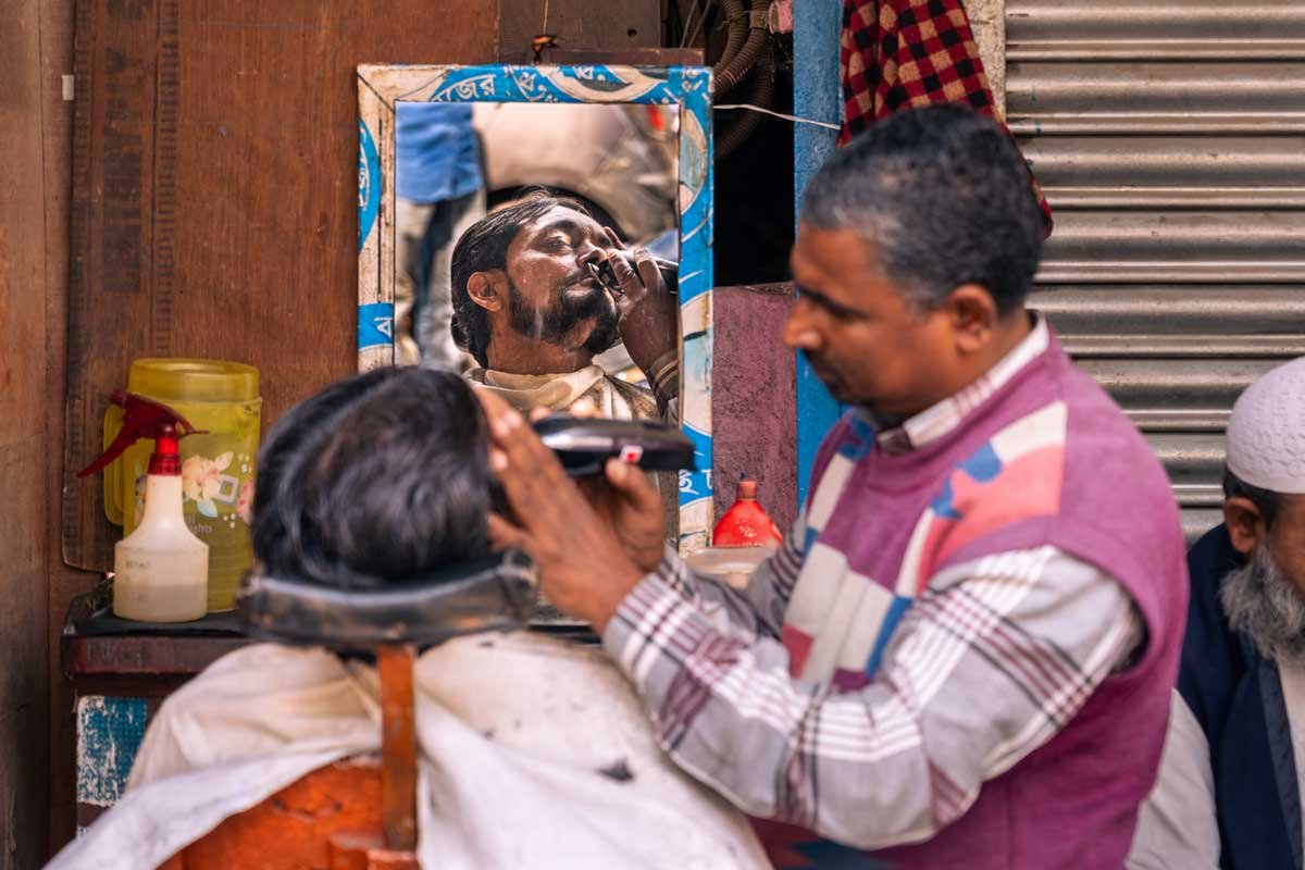barber shop by a street sidewalk
