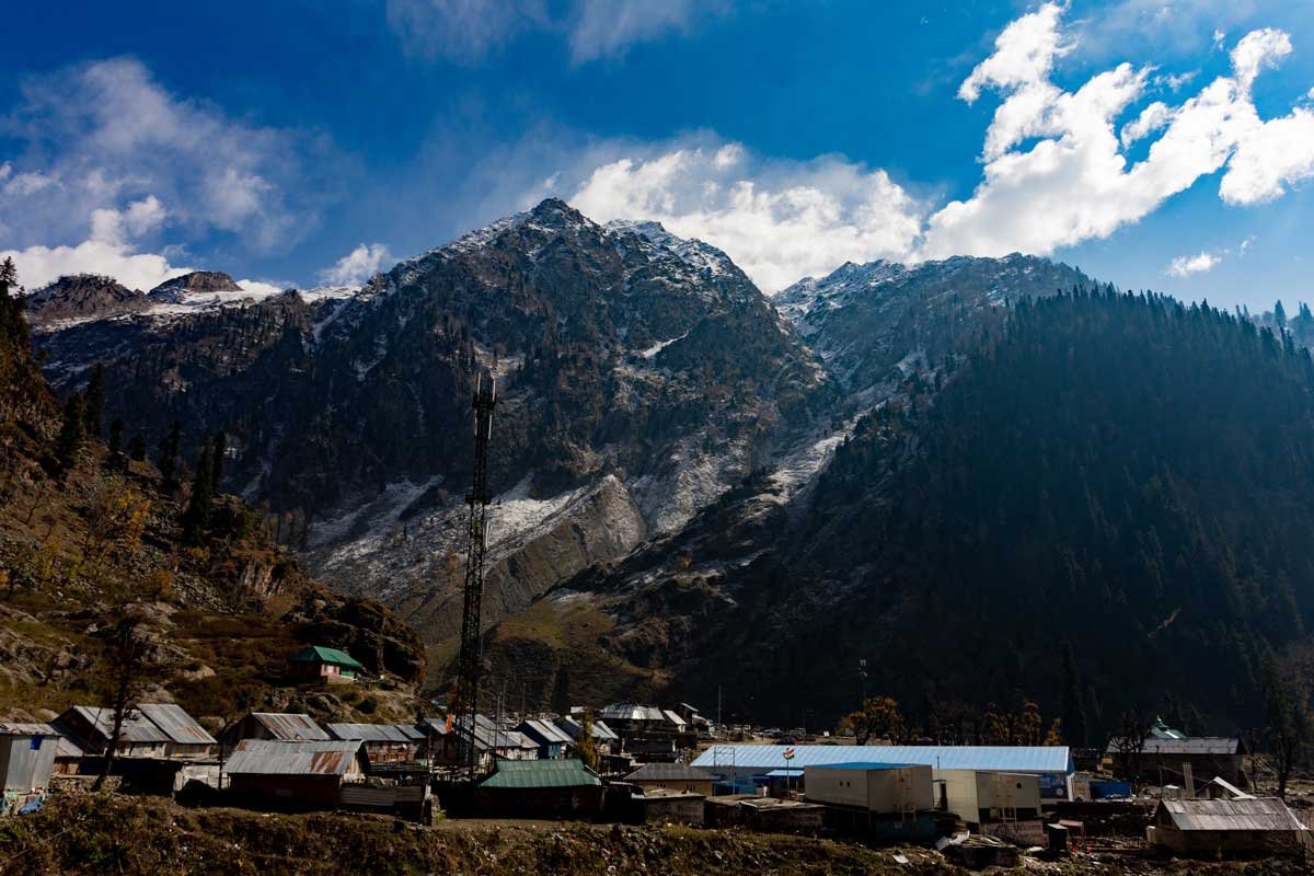 a small village near a snow mountain