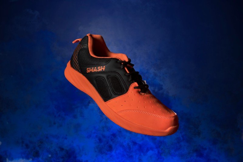 orange shoes on blue background