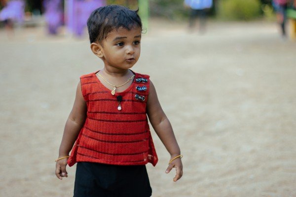 small girl looking something