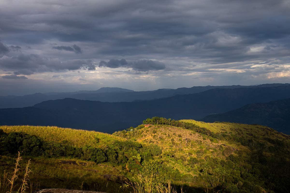 Hillside harmony under dark clouds