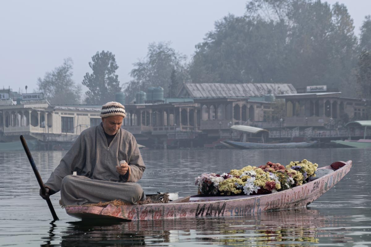 Man relaxing in mid of the lake