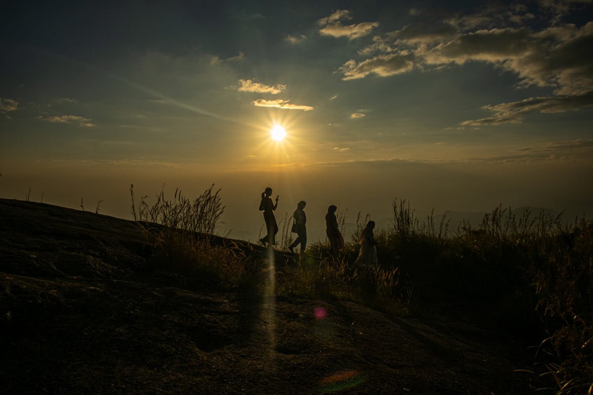 skyline silhouette formed under setting sun