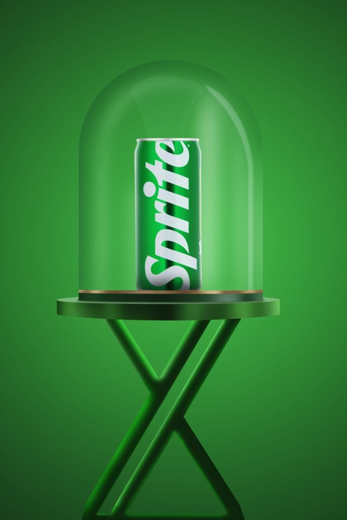 sprite can inside a glass cylinder