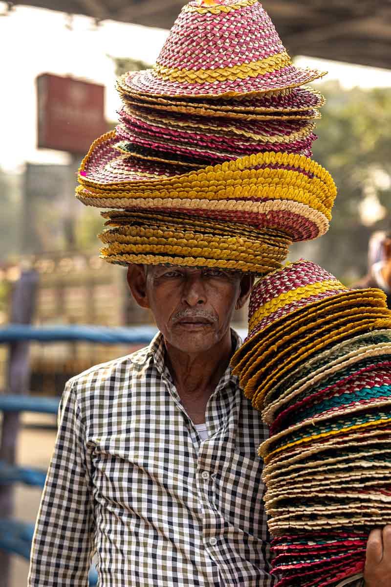 Street style of a hat vendor
