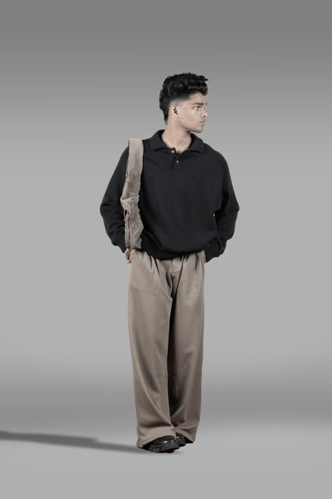 a man is standing with bag