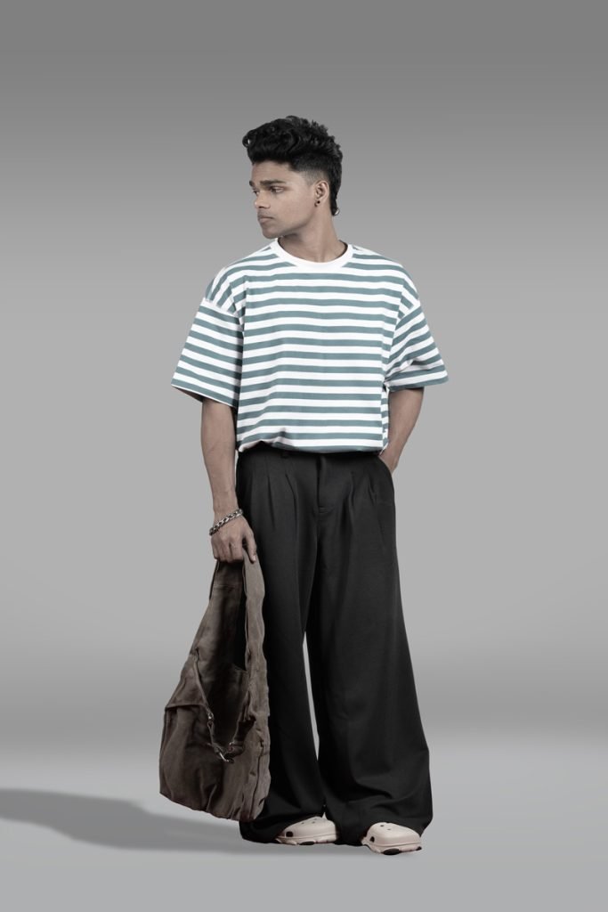 a man is standing and giving a pose