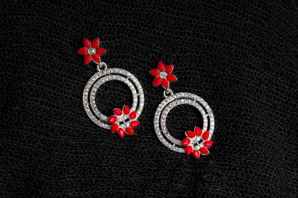 ear rings with rings and red flower