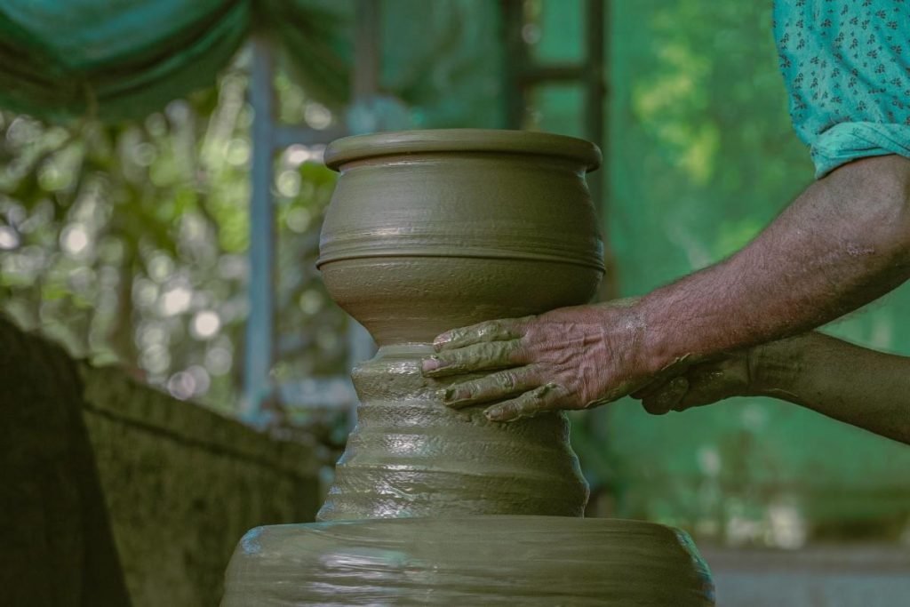 A man making clay pots