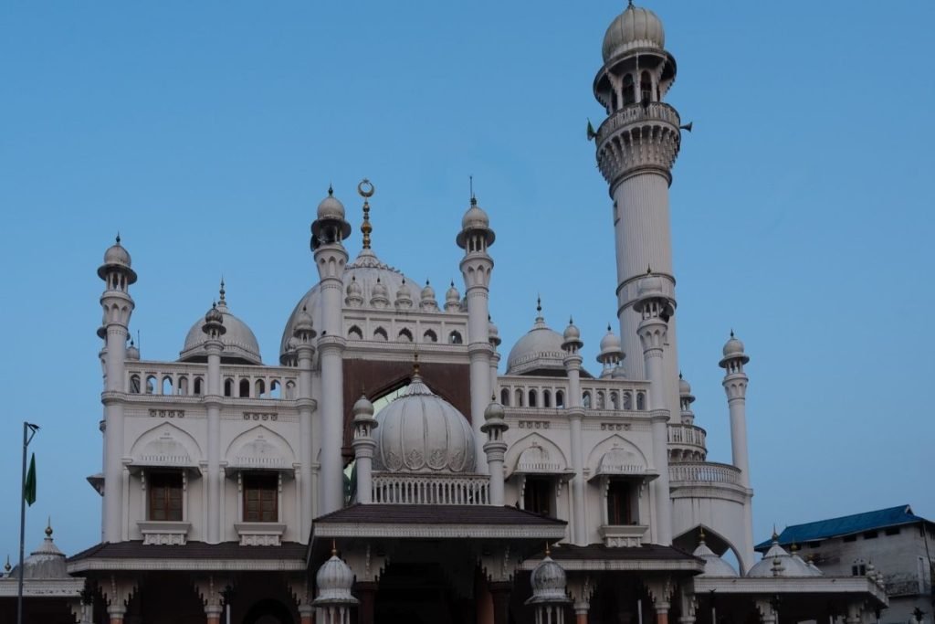 a mosque with blue sky background