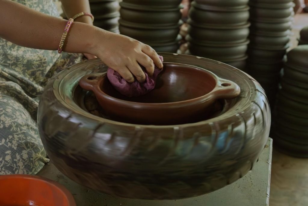 Pottery is given the final polishing