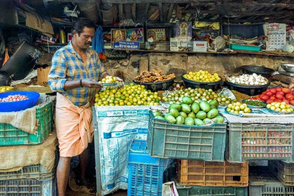 market vendor arranging lemons