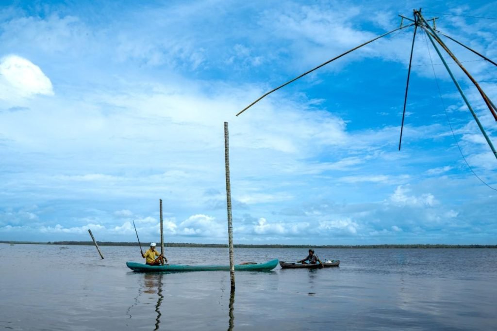 Fishermen fishing under blue sky