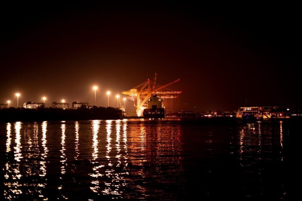 Harbor at night with reflections