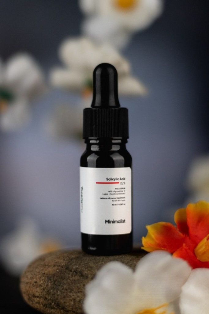 A black colour face serum for mens face