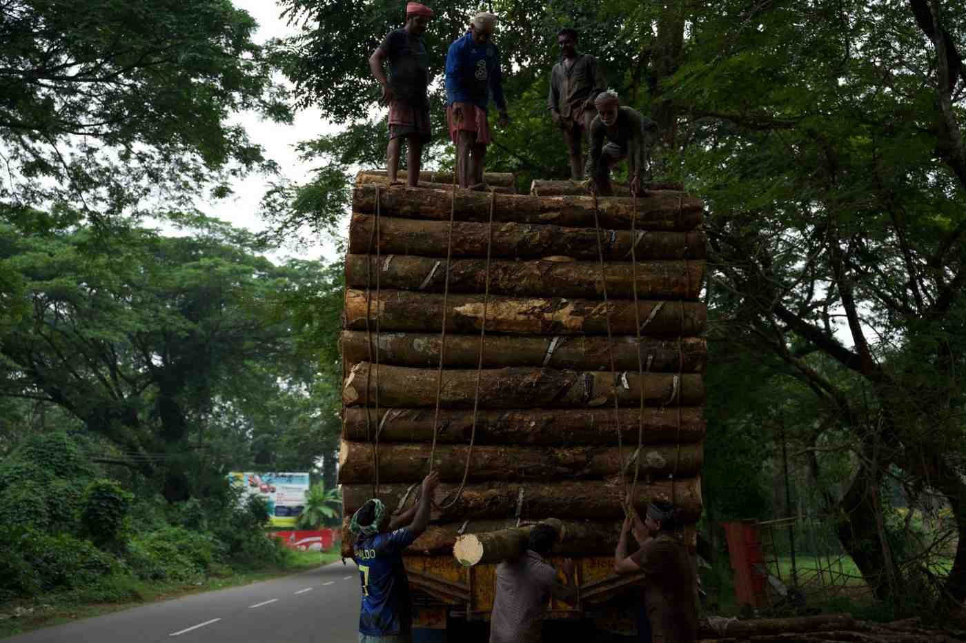 One person is giving the long to another four people they were up on the vehicle.