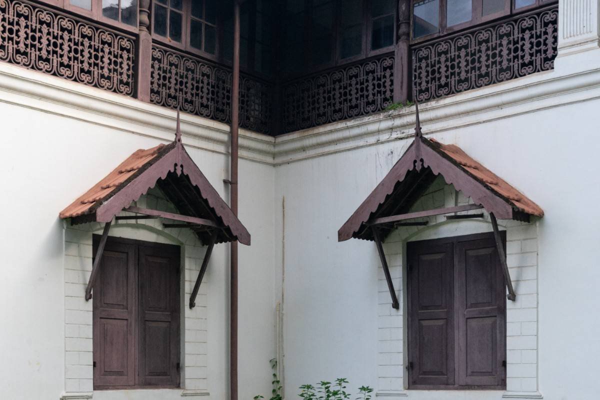 Closed windows of an old palace.