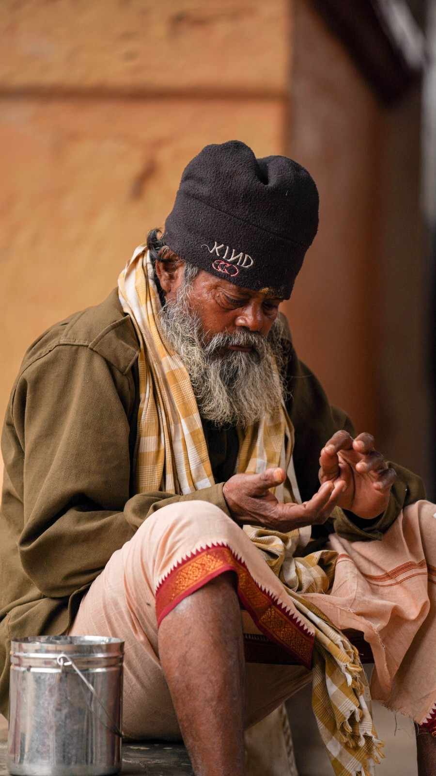a man is counting his coins