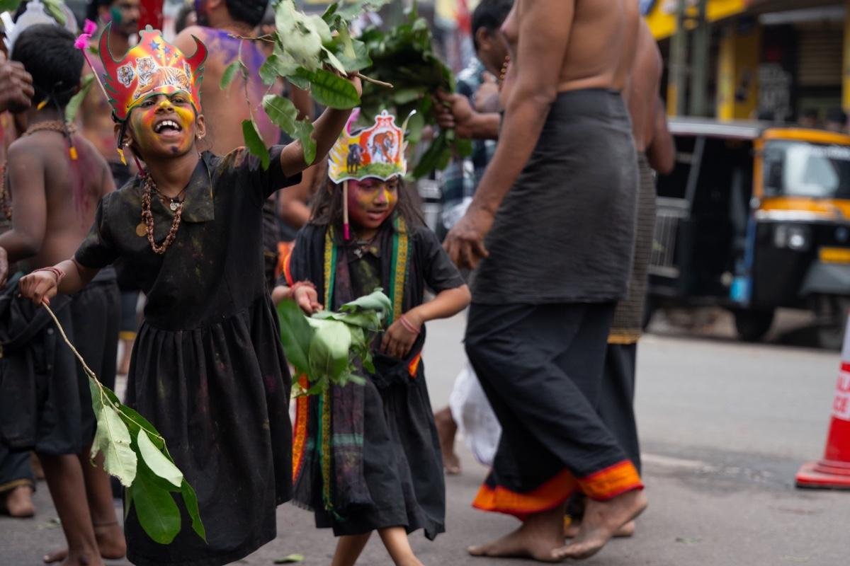 two sisters dancing with energy in Petta Thullal