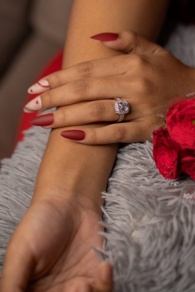 Woman wearing a radiant ring.