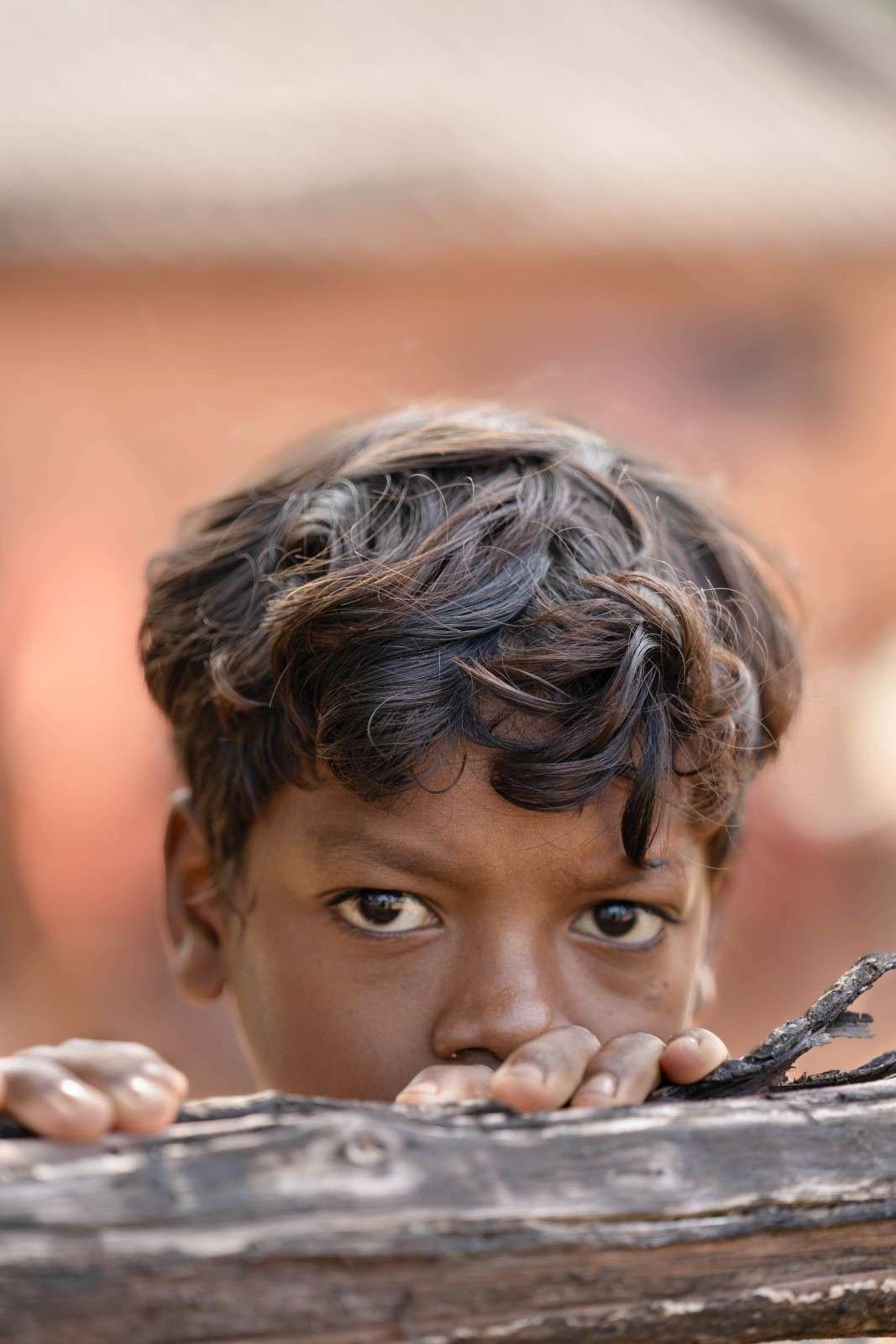 Small child gazing at camera.