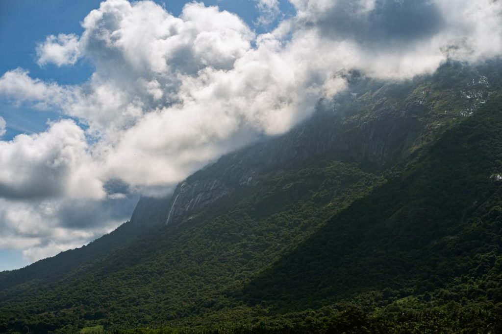 hillside cloud covered green mountains landscape
