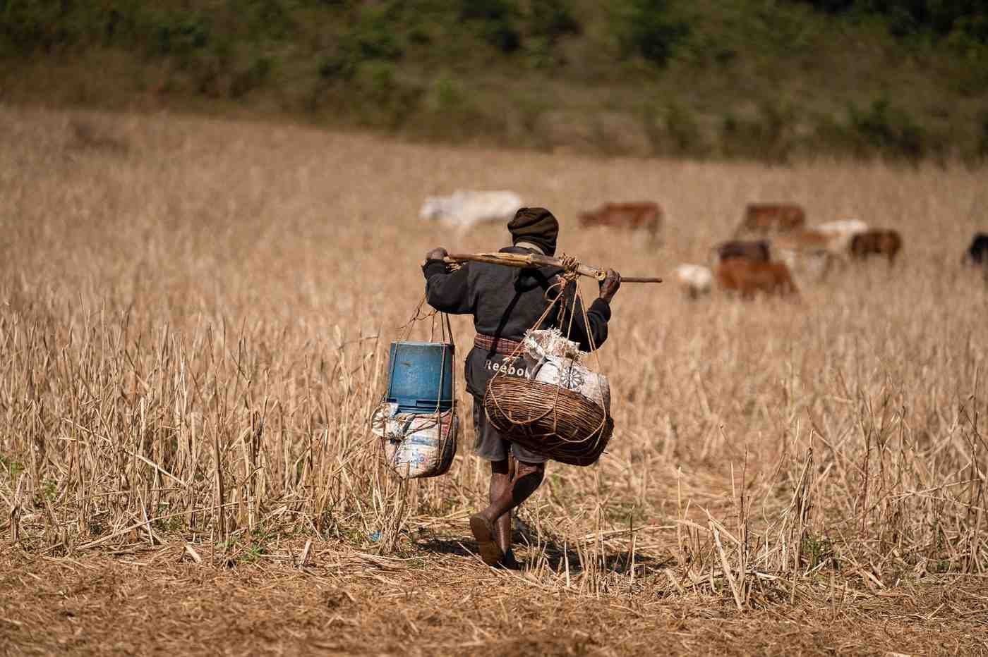 a man is walking with the goods