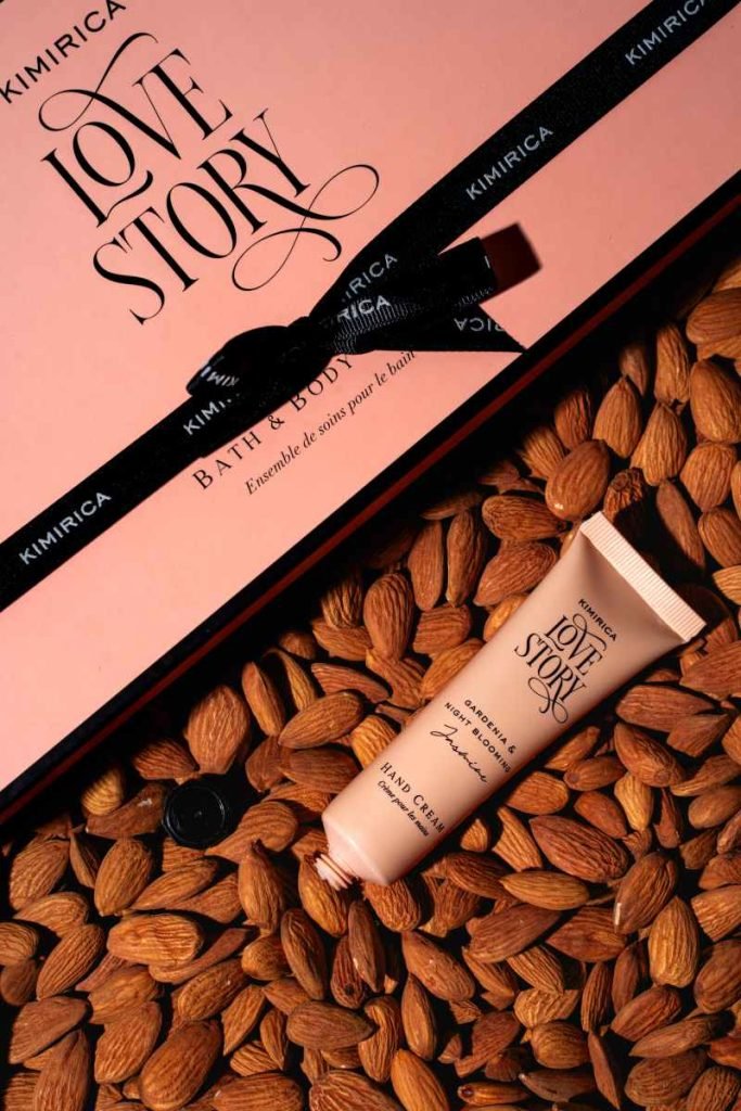 Hand cream tube on almonds.