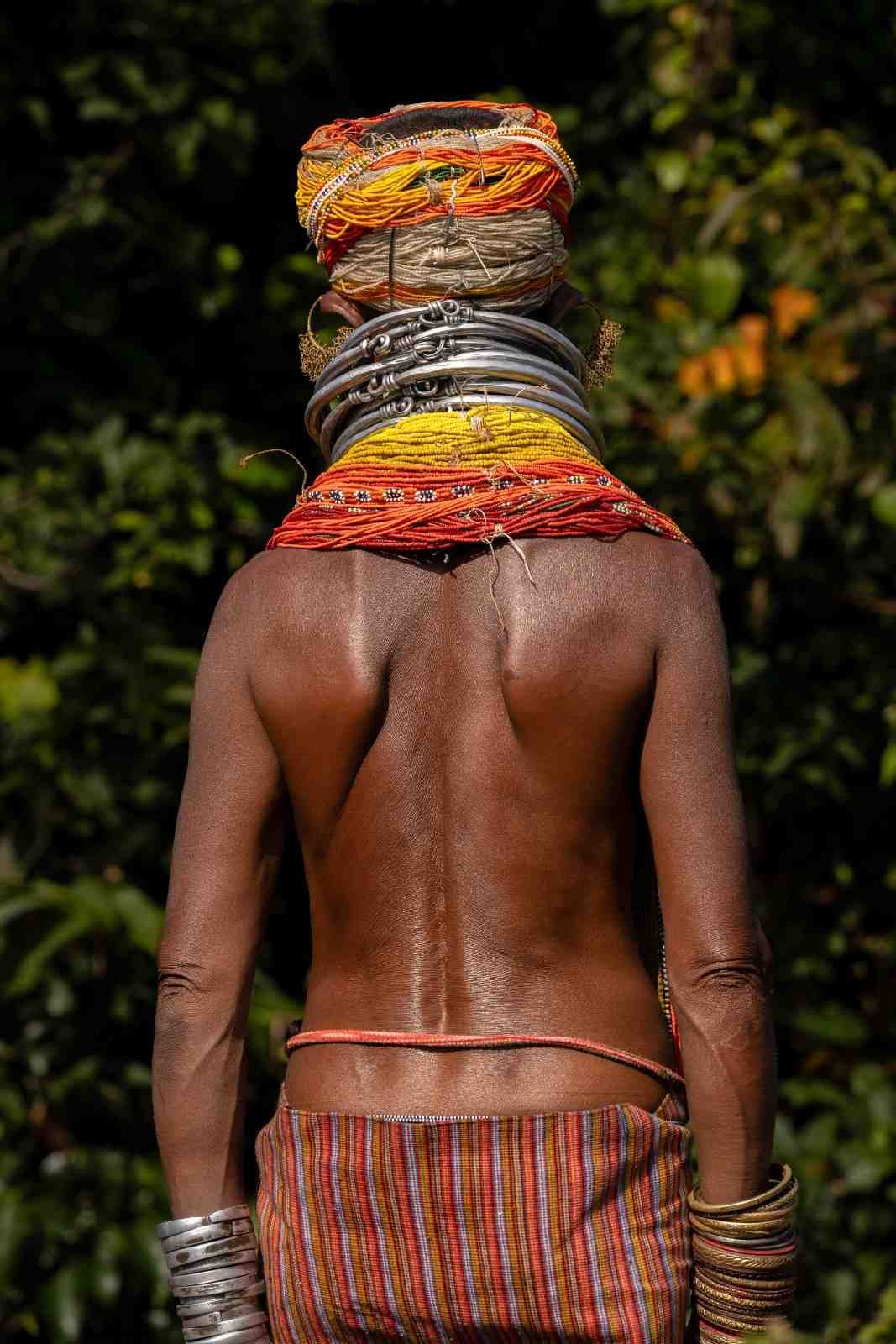 Tribal lady adorned with ornaments.