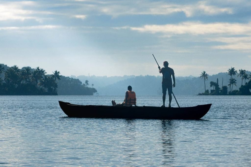man enjoying boat ride in a lake