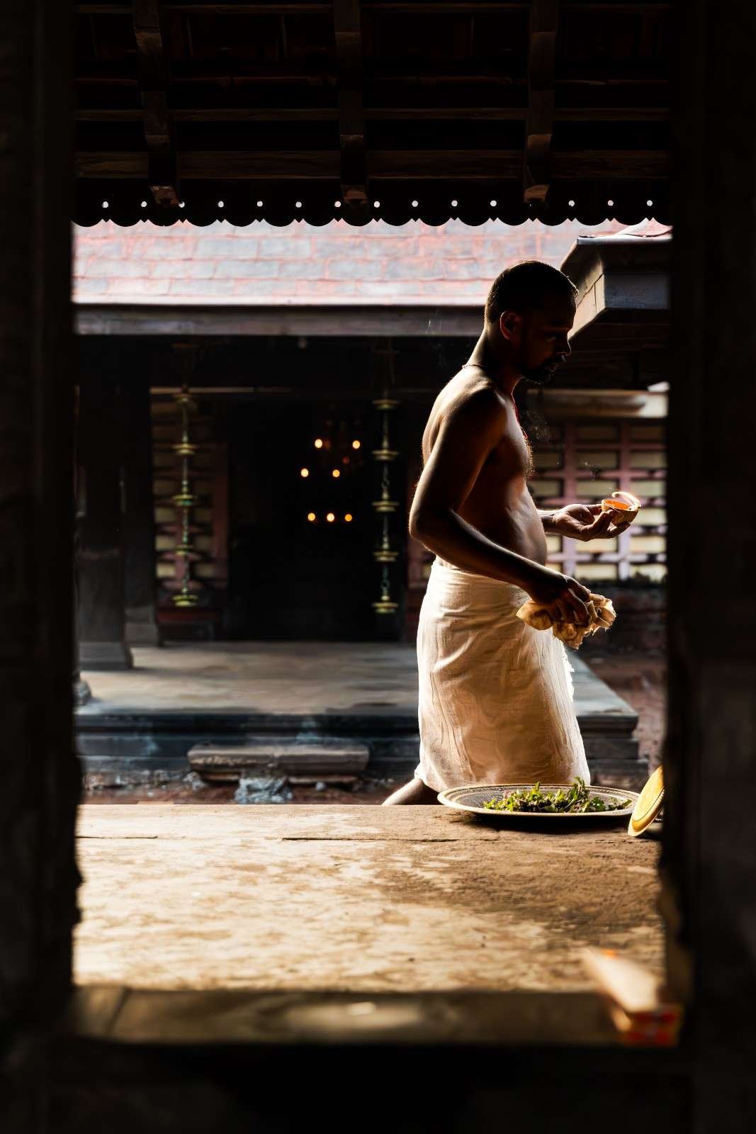 A person offering prayers.