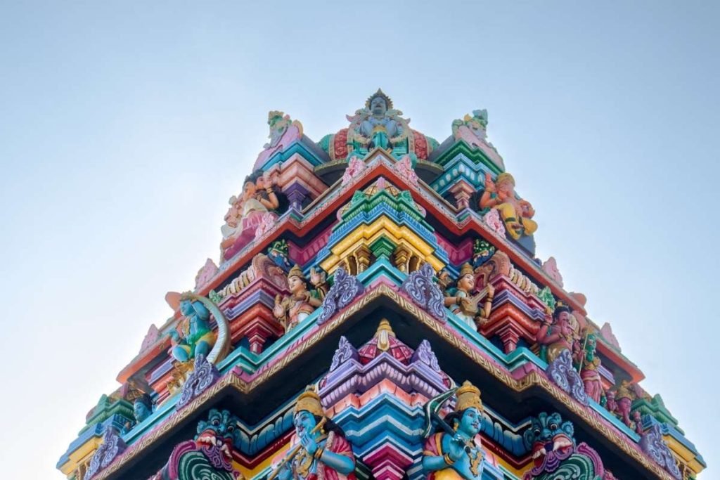 sculpted grace of temple's dome.