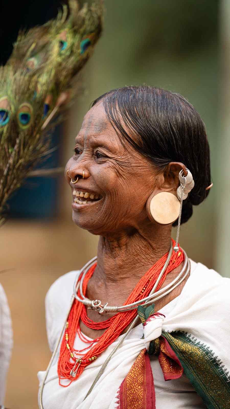 Woman laughs with peaceful ease.