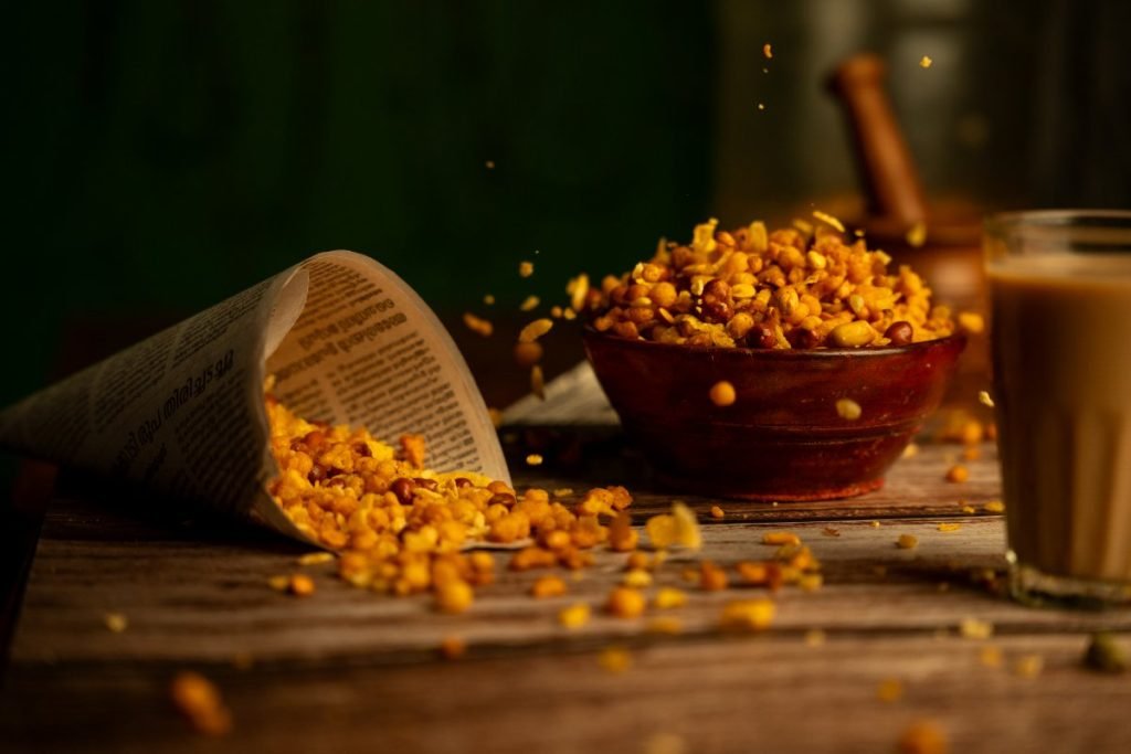 Crunchy snacks scattered on the surface.