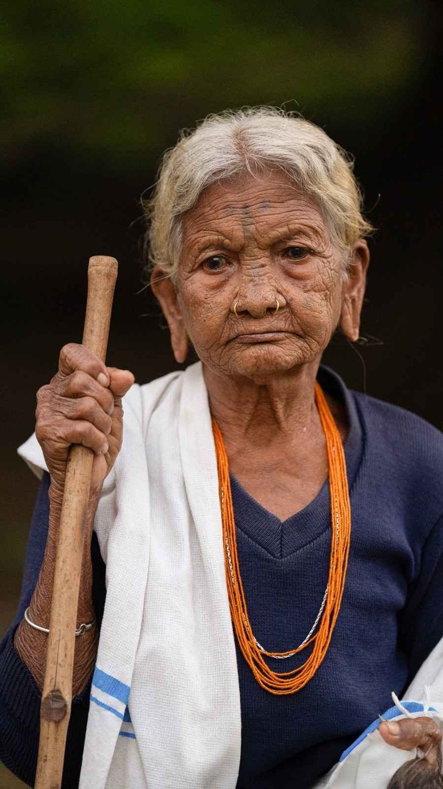 Old lady with a dull expression.