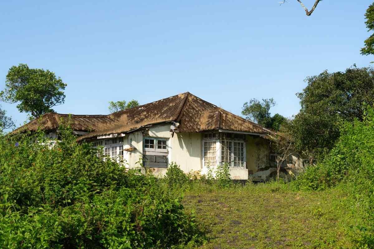 A wide view of an old bungalow.