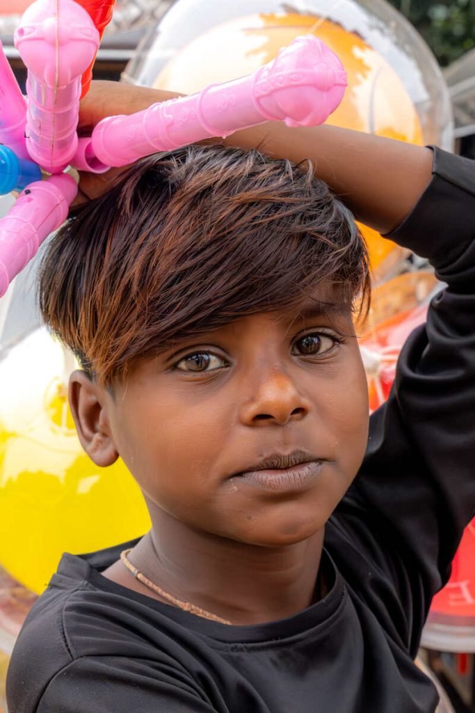 A kid selling toys with youthful energy