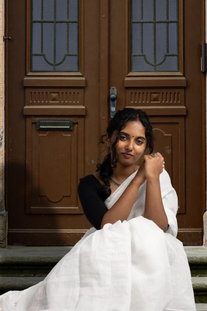 gentle drape in white saree