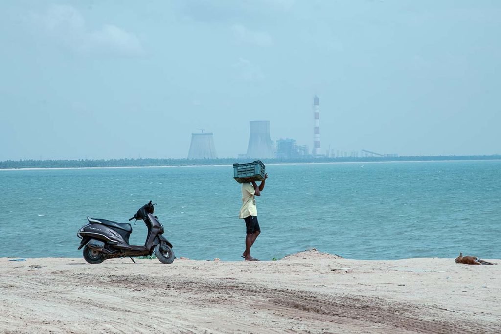 Carrying Horizons, a boy carrying boxes.